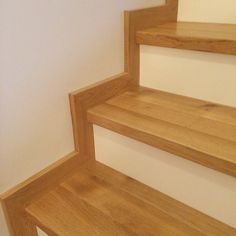 the stairs are made of wood and have no railings