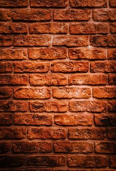 an old brick wall is shown in this image