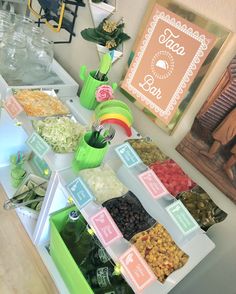 an assortment of food is displayed on a table