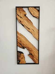 a piece of wood is hanging on the wall