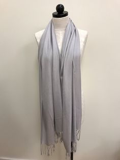 Light Grey Silver soft pashmina scarf 100% viscose Can be worn casually or dressed up You can wrap it around your neck, head, shoulder, or layer it with other apparel Dry Clean Recommended Spring Pashmina Shawl Scarf, Casual Solid Shawl Scarves, Elegant Pashmina Shawl For Spring, Casual Solid Shawl Scarf, Casual Solid Color Shawl Scarves, Casual Solid Color Shawl Scarf, Solid Color Pashmina Shawl, Solid Color Shawl Scarf One Size, Elegant Spring Pashmina Shawl