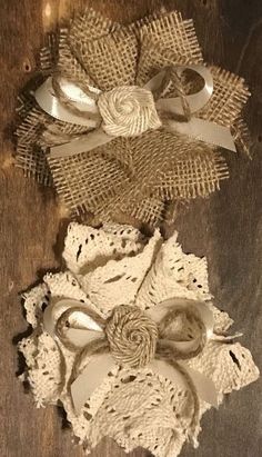 three pieces of burlock and lace on a wooden surface