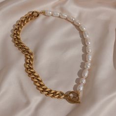 Pearl and chain choker necklace. Stainless steel, Freshwater Pearl, PVD platingTarnish Free, Hypoallergenic Chic White Chain Necklace For Everyday, White Chic Chain Necklace With Adjustable Chain, Chic White Chain Necklace With Adjustable Chain, Chic Pearl Chain Choker As Gift, Elegant White Chain Link Necklace, Elegant Metal Toggle Necklace, Chic Gold Pearl Chain Choker, Chic White Metal Chain Necklace, Elegant Metal Necklace With Toggle Clasp