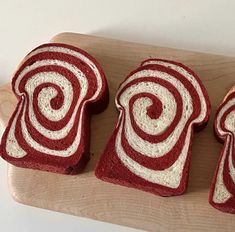 three slices of red and white swirl bread