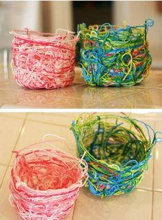 there are three different types of baskets on the floor and one is filled with yarn