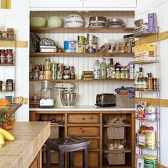 an open pantry with lots of food on the shelves