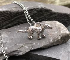 "Ferret Pendant on a 20\" stainless steel hypoallergenic 2.5mm link chain. Lovely little Pantalaimon Daemon that you can keep close to your heart. Great for the His Dark Materials fan in your family Supplied gift wrapped" Otter Necklace, Loose Tea Infuser, Wiccan Necklace, Dark Materials, Pentagram Necklace, His Dark Materials, Dark Material, Literary Gifts, Tree Of Life Necklace