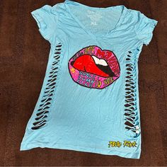 3 Med And 3 Xl Available $15 Each Trendy Ripped T-shirt For Summer, Trendy Distressed Summer Tops, Trendy Distressed Tops For Summer, Trendy Ripped Fitted Tops, Trendy Fitted Ripped Tops, Light Blue Tops For Spring Streetwear, Blue Distressed T-shirt For Summer, Blue Distressed Graphic Tee, Edgy Blue Tops With Graphic Print