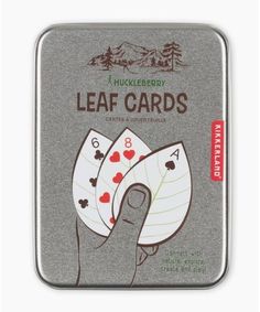 a tin with some cards in it on top of a white surface and the words leaf cards