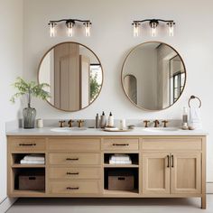 two round mirrors are above the double sink vanity in this bathroom with white tile flooring