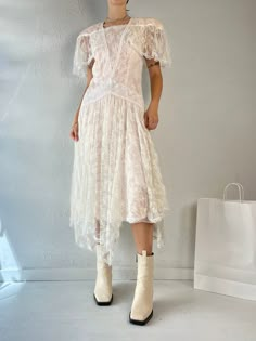 "- Vintage 1970s Gunne Sax by Jessica Mclintock Dress - 100% poly shell  - Made in USA - Zipper up the back - Tagged 9 Bust: 18\" Waist: 15\" Length: 47\"" Vintage A-line Midi Dress For Spring, Vintage White Dress For Spring Party, Vintage Mid-length Dresses, Vintage Midi Dress For Spring, Vintage Summer Dress For Casual Occasions, Summer Vintage Dress For Dress Down Occasions, Spring A-line Vintage Dress For Vintage Events, Vintage Flowy Midi Dress For Daywear, Spring Vintage Fitted Mid-length Dress