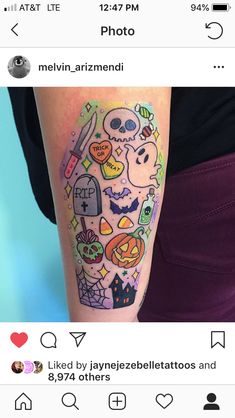 a person with a tattoo on their arm that is covered in stickers and skulls