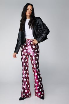 The pants edit. Feel like the centre of attention in our flare pants, made in high quality sequin fabric, with a flattering flared silhouette and a statement star pattern. Style the with a crop top or bralette for a stellar occasion look, perfect for anything from party nights to festival weekends and concerts. Small Star Sequin Flare Pants High Quality Sequin Fabric Flattering Flared Silhouette Stellar High Waistline Fun Star Patterning Zip Fastening in Back Model wears a size S (US size 6/UK size 10). Sequin Flare Pants, Going Out Trousers, Oasis Fashion, Star Pattern, Sequin Fabric, Fashion Face, Flare Pants, Bralette, Nice Dresses