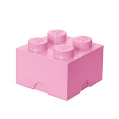 a pink lego brick with four small bricks in it