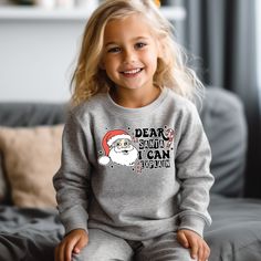 "Dear Santa Kids Shirt, Toddler Christmas Sweatshirt, Christmas Bodysuit, Christmas Shirts, Merry Christmas Kids Shirt, Cute Santa Kids Shirt HOW TO ORDER * Please review all the information provided before placing an order. 1. Select the style and size using the drop-down menu. 2. Select color 3. [APPLICABLE ONLY ON CERTAIN LISTINGS] Follow the instructions to fill out the \"Add your personalization\" option, e.g., specifying custom sayings or selecting design colors. 4. Select quantity Need more Items? Add the current item to the cart. And if you like to add more items to your order, please press the back button and repeat steps again. 5. Once all your desired items are in your cart you may complete your order by entering your payment method, desired shipping address and click submit. GA Eras Tour Outfits, Xmas Outfit, Christmas Shirts For Kids, Girl Shirts, Xmas Tees, Outfit Png, Boo Crew, Toddler Christmas, Halloween Shirts