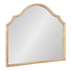 a mirror that is sitting on top of a wall with a wooden frame and wood trimming