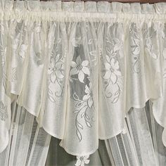 PRICES MAY VARY. Semi-sheer ombre ivory hue Polyester Ascot Valance has scalloped bottom edges Charming vining flower design Hangs via 1.5 inch rod pockets Measures 55Wx20L inches The Marisol Window Treatment adorns your view with delicate florals. With a unique semi-sheer ombre ground, each solid color polyester window accent features sweetly vining and cascading blossoms, scalloped bottom edges, and a 1.5 rod pocket. Specify Curtain Panel, 55 W; Ascot Valance, 55 Wx20 L; or Swag Valance Pair, French Lace Curtains, Lace Window Treatments, Window Swags, Sheer Valances, Lace Window, Luxury Curtains, Beautiful Curtains, Lace Curtains, Valances