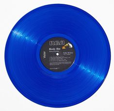 a blue vinyl record on a white background