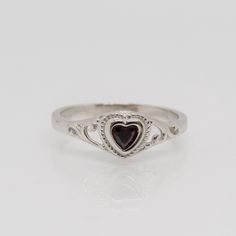 Sterling Silver Garnet Heart Filigree Ring ...Marked 925...Total of weights 1.7grams...Size 6...Measure of Face 6.6MM...It's in very good condition. Silver Promise Rings, Garnet Ring Silver, Garnet Heart, Solitaire Rings, Jewelry Accessories Ideas, Filigree Ring