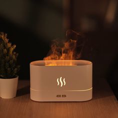 'Xefar' Ultrasonic Flame Simulation Oil Diffuser - Your Key to a Serene, Relaxing, and Ambience-Filled Home! This premium device uses advanced ultrasonic technology to create a soothing mist that diffuses your favorite essential oils throughout your space, while the stunning flame simulation effect provides a calming and inviting atmosphere. Ultrasonic atomizing aroma Simulated flame lighting effect Anhydrous power failure protection Bright adjustment feature Atomizes water and oil through ultra Dust Allergy, Aromatherapy Humidifier, Humidifier Essential Oils, Air Diffusers, Air Humidifier, Fragrance Diffuser, Essential Oil Fragrance, Aromatherapy Oils, Aromatherapy Diffusers