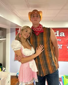 a man and woman dressed up in costumes