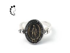 Silver double sided ring,Virgin Mary Ring,Two Sided Ring,Flip Ring,Religiou Jewelry,Stackable Ring,Silver ring for woman,Unisex ring Material: 925 Sterling silver Size: - Type: Stackable ring - Approx Size: 8.5US - Band width:2 Millimeter - Weight: 5.5g This ring is made entirely of sterling silver. The ring face of this ring can be flipped, and the patterns on both sides are different.  Go to the store and go home: https://www.etsy.com/shop/LuckyBeadsSupply If you have any questions, please fee Virgin Mary Ring, Flip Ring, The Ring Face, Stackable Rings Silver, La Face, Unisex Ring, Stackable Ring, Double Face, Ring Silver