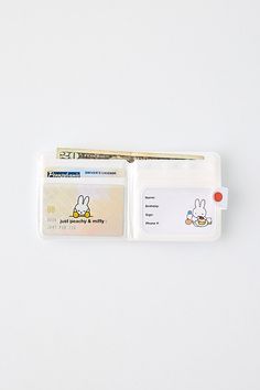 Carry our fave bunny with you wherever you go with this vinyl wallet from Just Peachy featuring Miffy motifs allover. Complete with four card slots, a clear ID slot and a cash pouch to carry all your essentials. Due to the vinyl fabrication of this wallet, please avoid overstuffing. Features Just Peachy X Miffy Vinyl Wallet Officially licensed Miffy wallet Snap closure Four card slots & a clear ID slot Cash pouch Perfect for gifting Content + Care Vinyl Wipe clean Imported Size Dimensions: 4" l Miffy Wallet, Miffy Merch, Just Peachy, Wellness Gifts, Present Ideas, And Sign, Stuff I Want, Snap Closure, Color Coding