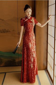 This is a stunning red cheongsam dress that is adorned with shimmering sequins and meticulously hand-beaded details. It features a fresh design while still preserving the traditional elements. It is suitable for various occasions such as wedding attire, formal events, and even as a hostess dress. Customization options are available. Size Chart: S： Chest-78-82cm,  Waist-59-63cm M:   Chest-82-86cm, Waist-63-67cm L:    Chest-86-90cm, Waist-67-72cm XL:  Chest-90-94cm, Waist- 71-75cm XXL: Chest-94-98 Chinese Wedding Cheongsam, Traditional Thai Wedding Dress, Red Qipao Wedding, Red Chinese Aesthetic, Red Formal Outfit, Red Ao Dai Wedding, Chinese Style Prom Dress, Chinese Tea Ceremony Dress, Chinese Inspired Dress