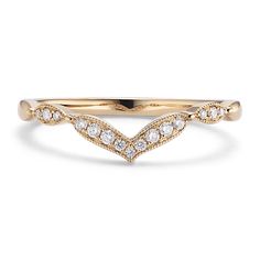 Delicate milgrain detail frames the natural diamonds in this ornate  vintage-inspired chevron band that shines with hand-matched sparkle and fire. Whether worn alone or hugging your engagement ring  the contour shape of this gorgeous 14-karat yellow gold band offers a unique look. Wedding Diamond Jewelry With Milgrain, Milgrain Diamond Wedding Jewelry, Wedding Diamond Milgrain Jewelry, Elegant Milgrain Diamond Ring For Wedding, Elegant Milgrain Diamond Wedding Ring, Random Products, Chevron Wedding, Contour Wedding Band, High Jewelry Ring