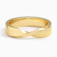 a yellow gold wedding band with an intertwined design