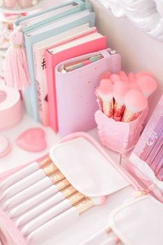 there are many pink items on the table