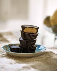 chocolates stacked on top of each other on a plate