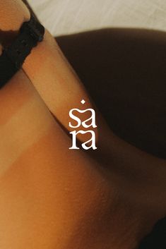 a woman's legs with the word saja written in white on top of it