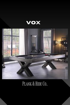 a pool table in the middle of a room