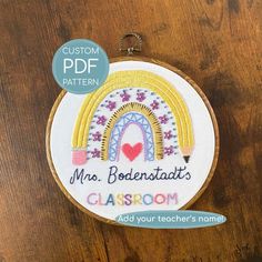 this is an embroidery pattern for a teacher's room or classroom badge with the name mrs bodenatatti's classroom on it