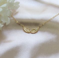 Embrace your inner angel with this delicate and ethereal angel wing necklace. A symbol of protection and guidance, perfect for any occasion. Wear this as a reminder that you have an angel watching over you. Perfect for yourself as well as gifting to someone special.IT'S IN THE DETAILS✦ 14K gold filled or sterling silver necklace chain✦ Gold plated Brass or Sterling Silver Angel Wings 20 x 8mm with tarnish resistant coating✦ Offered in 2 different styles and multiple lengths for a custom fit ✧ Ne Angel Wing Necklace Gold, Ethereal Angel, Angel Wings Necklace, Guardian Angel Necklace, Angel Wings Jewelry, Symbol Of Protection, Silver Angel Wings, Angel Wing Necklace, Angel Necklace