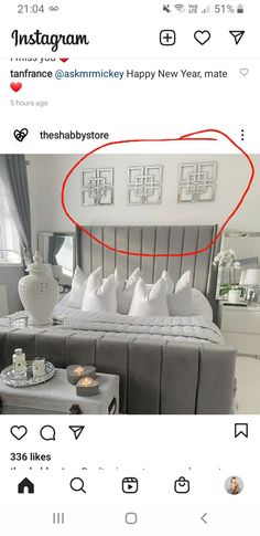 the instagram page has an image of a bed with white pillows and gray furniture