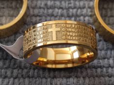 Orthodox Christian Lords Prayer Ring Dimenzian 24, mm Description: Picture is of actual item. On the ring there passes an engraving with an inscription in English. Lord's Prayer Our Father, who art in heaven, Hallowed be thy Name. Thy Kingdom come. Thy will be done in earth, As it is in heaven. Give us this day our daily bread. And forgive us our trespasses, As we forgive them that trespass against us. And lead us not into temptation, But deliver us from evil. For thine is the kingdom, The power Lead Us Not Into Temptation, As It Is In Heaven, Prayer Ring, Our Father Who Art In Heaven, Lords Prayer, Thy Kingdom Come, Thy Will Be Done, Marriage Ring, Lord's Prayer