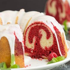 a red velvet cake with white frosting on a plate