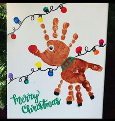 a christmas card with a handprint on it