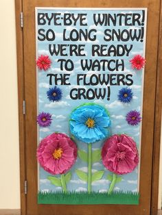 a door decorated with flowers and the words bye bye winter so long snow we're ready to watch the flowers grow