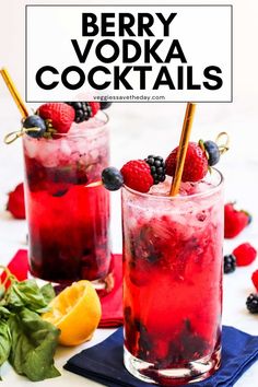 two glasses filled with berry vodka cocktails and garnished with berries