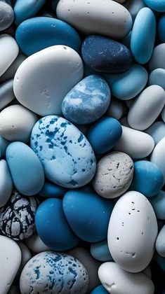 blue and white rocks are piled together