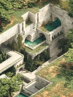 an aerial view of a building with water in it