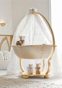 a baby crib with teddy bears in it