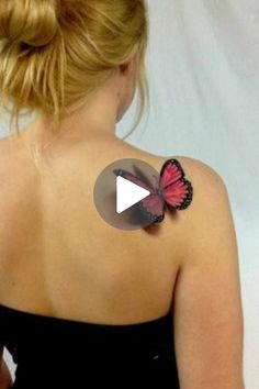 a woman with a butterfly tattoo on her back