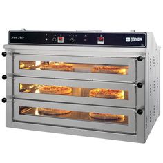 an electric pizza oven with three trays on the front and one in the back