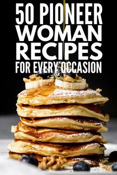 a stack of pancakes with blueberries on top and the words 50 pioneers woman recipes for every occasion