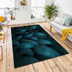 a living room area rug with blue leaves on it