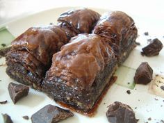 two pieces of chocolate dessert on a plate